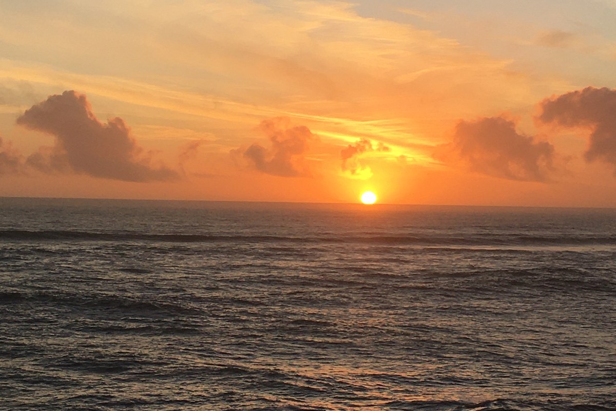 sun setting over the Pacific Ocean in Santa Cruz, California